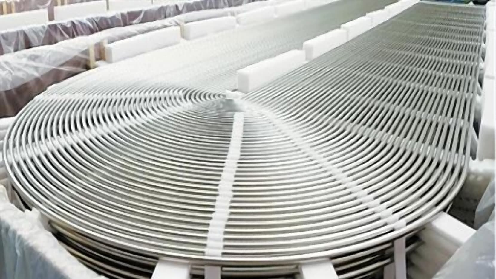 Extruded finned tube bundle